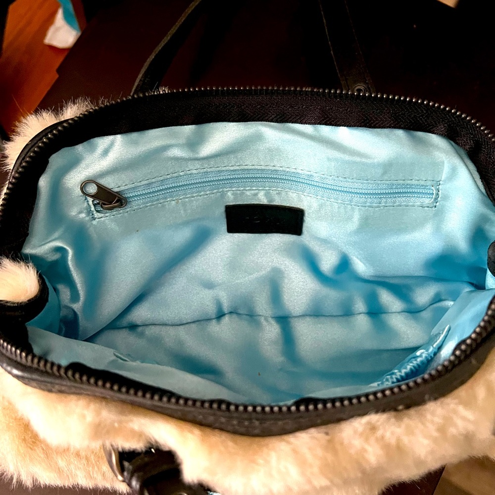 Roxy hand purse practically brand new